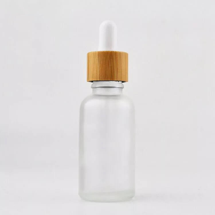Customized Bamboo Lid Essential Oil Bottles Glass Dropper Bottle with Wooden Cap Cosmetic Empty