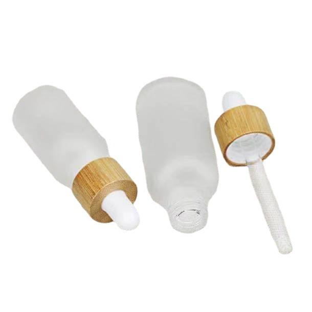Customized Bamboo Lid Essential Oil Bottles Glass Dropper Bottle with Wooden Cap Cosmetic Empty