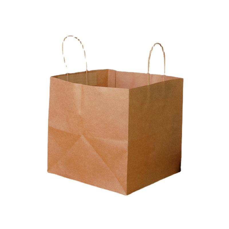 Healthy platter takeaway divided chicken pieces and French fries packed lunch box double kraft paper food packaging
