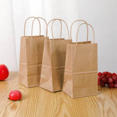 Healthy platter takeaway divided chicken pieces and French fries packed lunch box double kraft paper food packaging