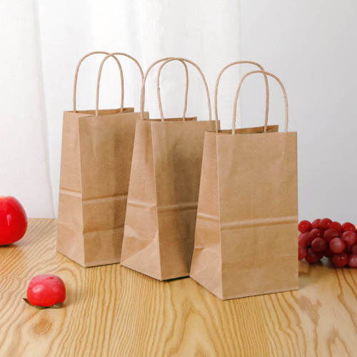 Healthy platter takeaway divided chicken pieces and French fries packed lunch box double kraft paper food packaging