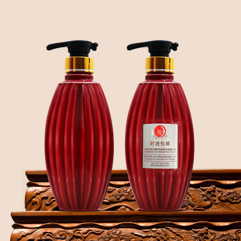 Boutique striped 550ml shampoo bottle PET special-shaped shower gel conditioner bottle with golden lotion pump