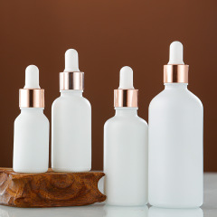 White glass essential oil bottle essence liquid rubber head dropper bottle multi-specification portable cosmetic sample empty bottle wholesale