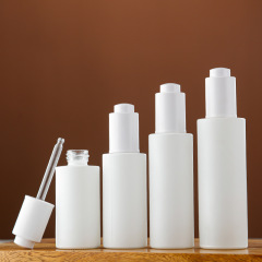 White glass flat shoulder essential oil bottle push dropper essence bottle multi-specification portable cosmetics empty bottle wholesale