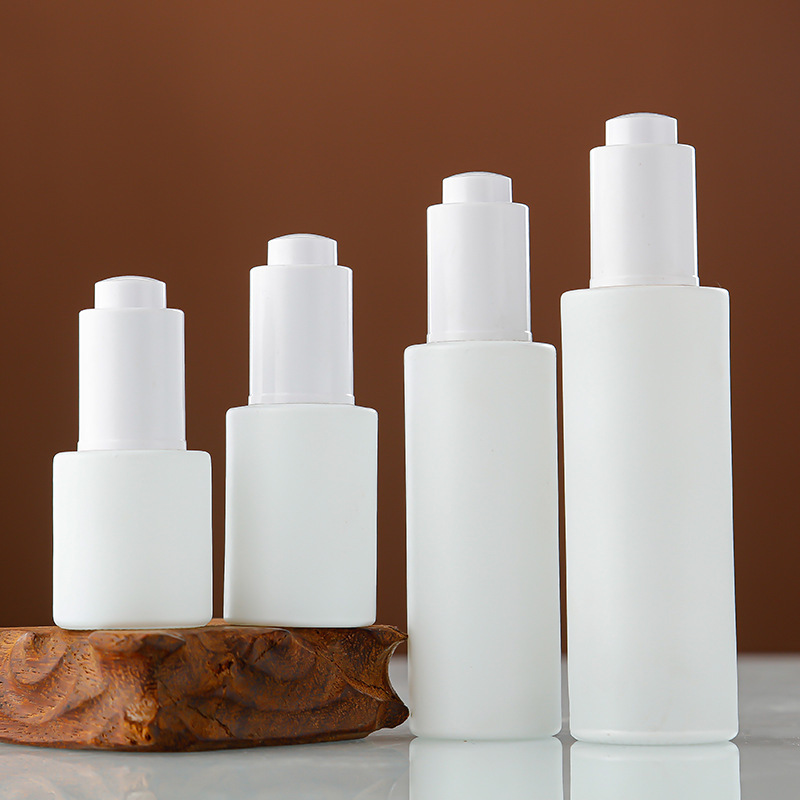White glass flat shoulder essential oil bottle push dropper essence bottle multi-specification portable cosmetics empty bottle wholesale