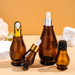 Brown glass essential oil bottle light-proof creative gourd rubber dropper bottle essence cosmetics packaging empty bottle wholesale