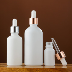 White glass essential oil bottle essence liquid rubber head dropper bottle multi-specification portable cosmetic sample empty bottle wholesale