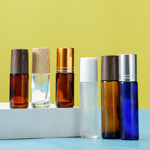 Colorful roller bottle with cover essential oil bottle perfume bottle wood grain cover transparent frosted glass bottle 5ml10ml