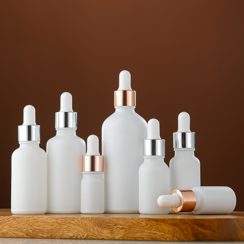 White glass essential oil bottle essence liquid rubber head dropper bottle multi-specification portable cosmetic sample empty bottle wholesale