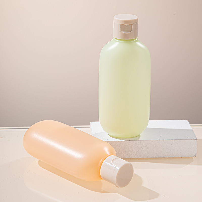 PE plastic bottle matte semi-transparent oval bottle 100ml washing bottle trial pack flip butterfly cover lotion bottle