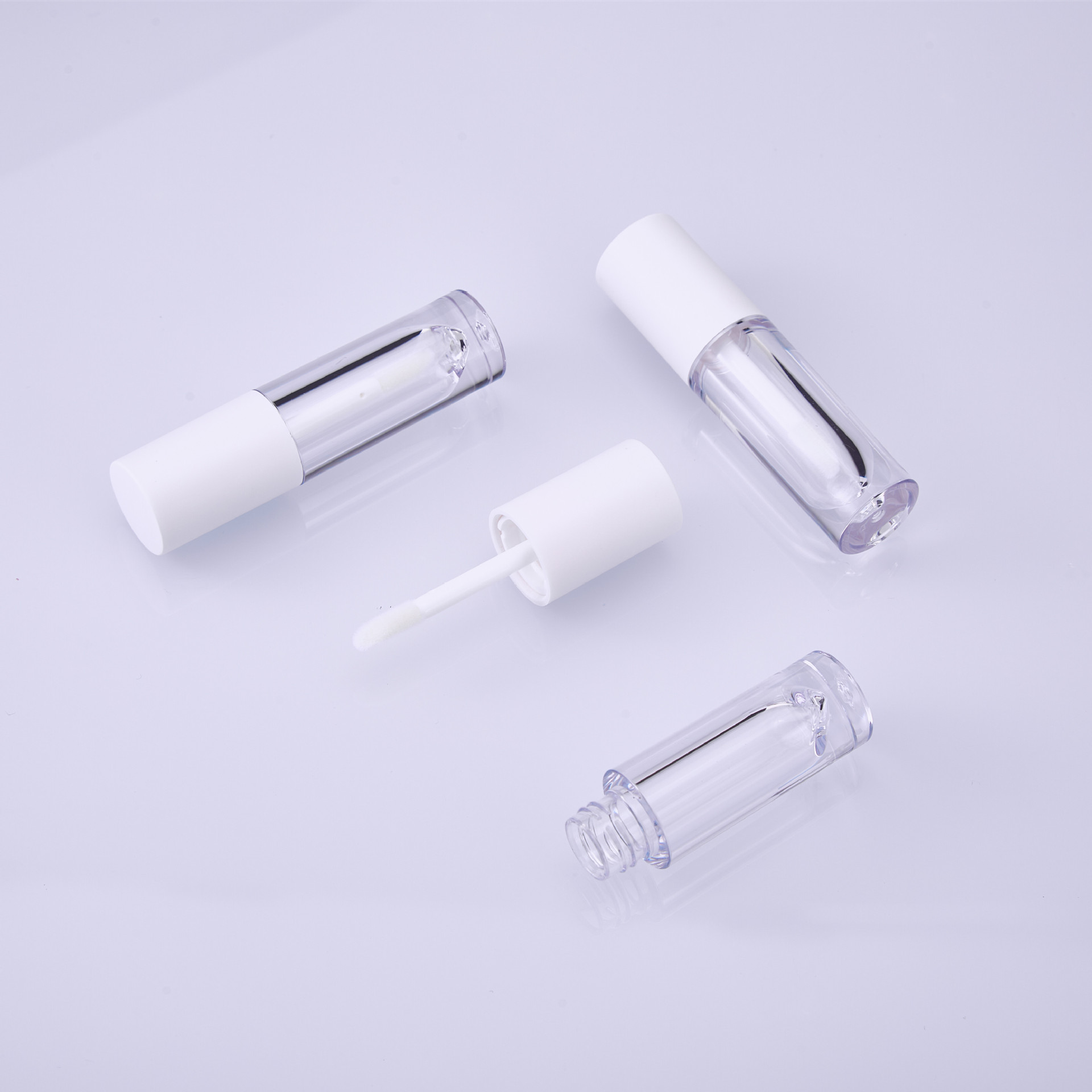 Manufacturers wholesale round lip glaze tube lip glaze empty tube transparent bottle 3ml lipstick empty tube can print logo