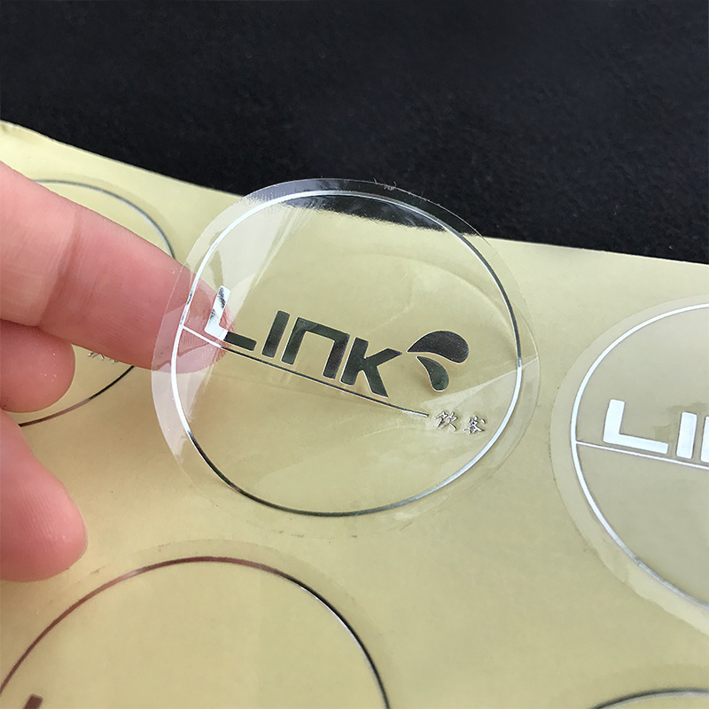 Custom self-adhesive transparent PVC hot stamping sticker round waterproof sealing sticker custom logo label manufacturer