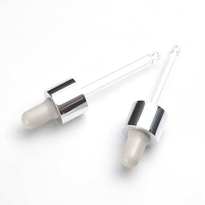 Supply 20-tooth silicone dropper PVC bright silver middle ring silicone head transparent glass dropper press easy wholesale