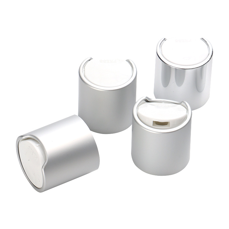 Supply 24MM anodized aluminum Qianqiu cover PP plastic silver glossy press cover lotion bottle cap factory wholesale