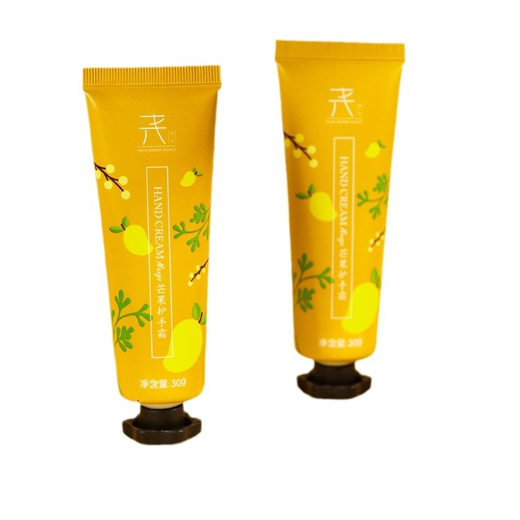 Customized cosmetic packaging material 30g hand cream plastic hose with small plum blossom cover
