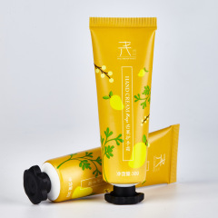 Customized cosmetic packaging material 30g hand cream plastic hose with small plum blossom cover