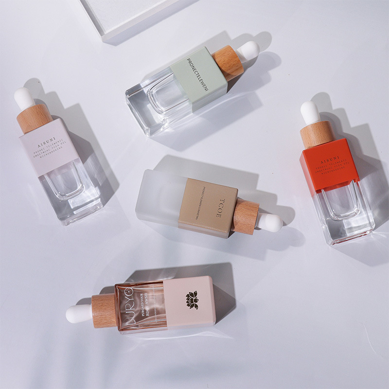 Cosmetic glass packaging material petal bottle lotion dispensing bottle push water bottle thick bottom high-end water lotion dispensing bottle