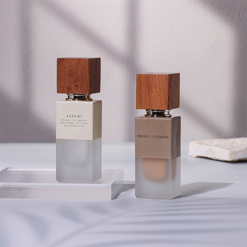 New two-color process liquid foundation bottle 20ML isolation bottle 30ML essence liquid empty bottle 50ML wood grain cover