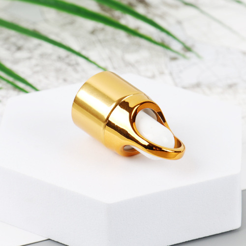 Supply all kinds of cosmetic essence essential oil flower basket dropper cap electroplating gold stamping aluminum plastic cap