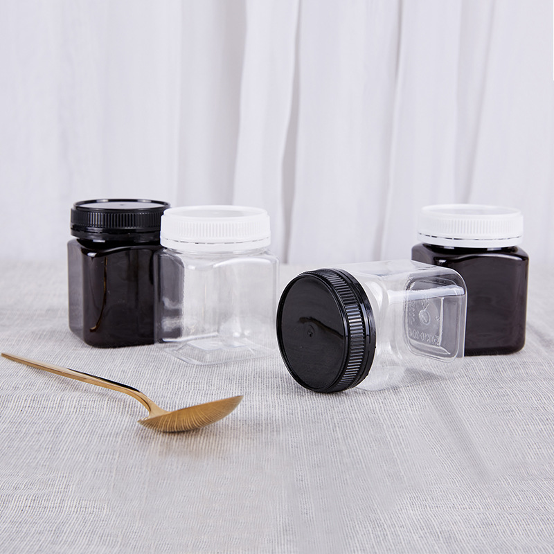 Wholesale plastic honey bottle 250g300g500g1000g honey jar 1 catties black anti-theft square honey bottle