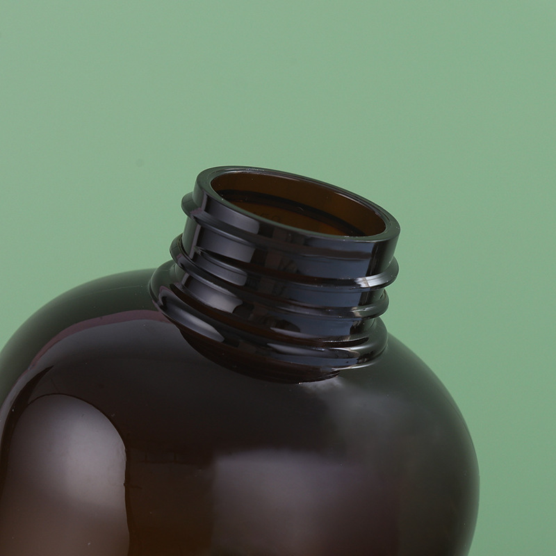 Body lotion bottle Simple plastic care packaging material brown round shoulder shampoo body lotion bottle