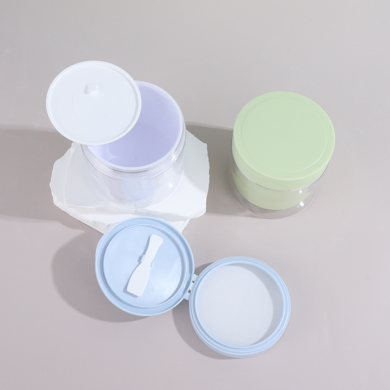 Manufacturer 200ml facial mask jar Fashion transparent plastic skin care product packaging material with spoon wide mouth dispensing mud mask mask jar
