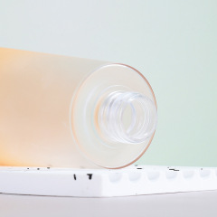 Manufacturer 250ml bath oil bottle transparent PETG thick wall cosmetic packaging material round push lotion bath oil bottle