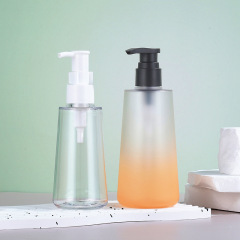 Manufacturer 250ml bath oil bottle transparent PETG thick wall cosmetic packaging material round push lotion bath oil bottle