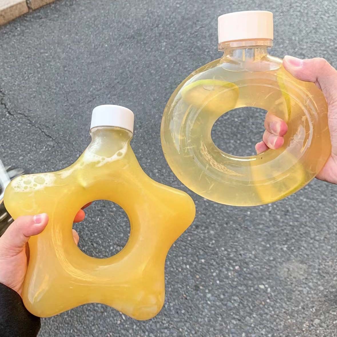 Five-pointed star donut bottle is here. Transparent plastic pet bottle has high value, cute shape and unique girly style.