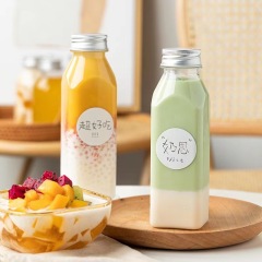 Wholesale 350ml oblique shoulder square bottle PET plastic transparent disposable juice beverage bottle net celebrity milk tea bottle packaging bottle
