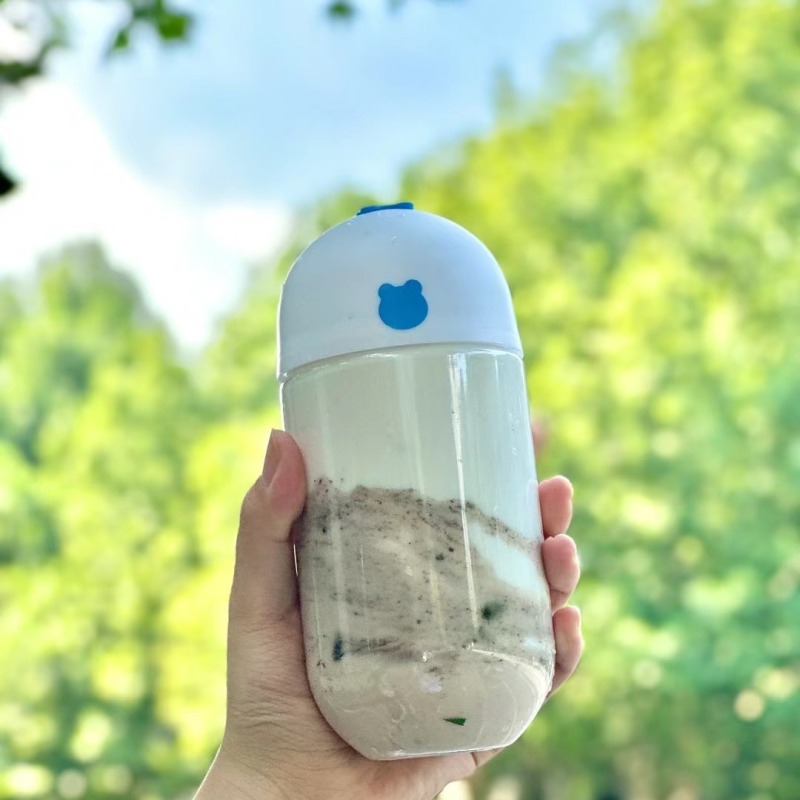 Disposable 500ml capsule bottle transparent milk tea pet take-away beverage with lid internet celebrity U-shaped plastic bottle factory