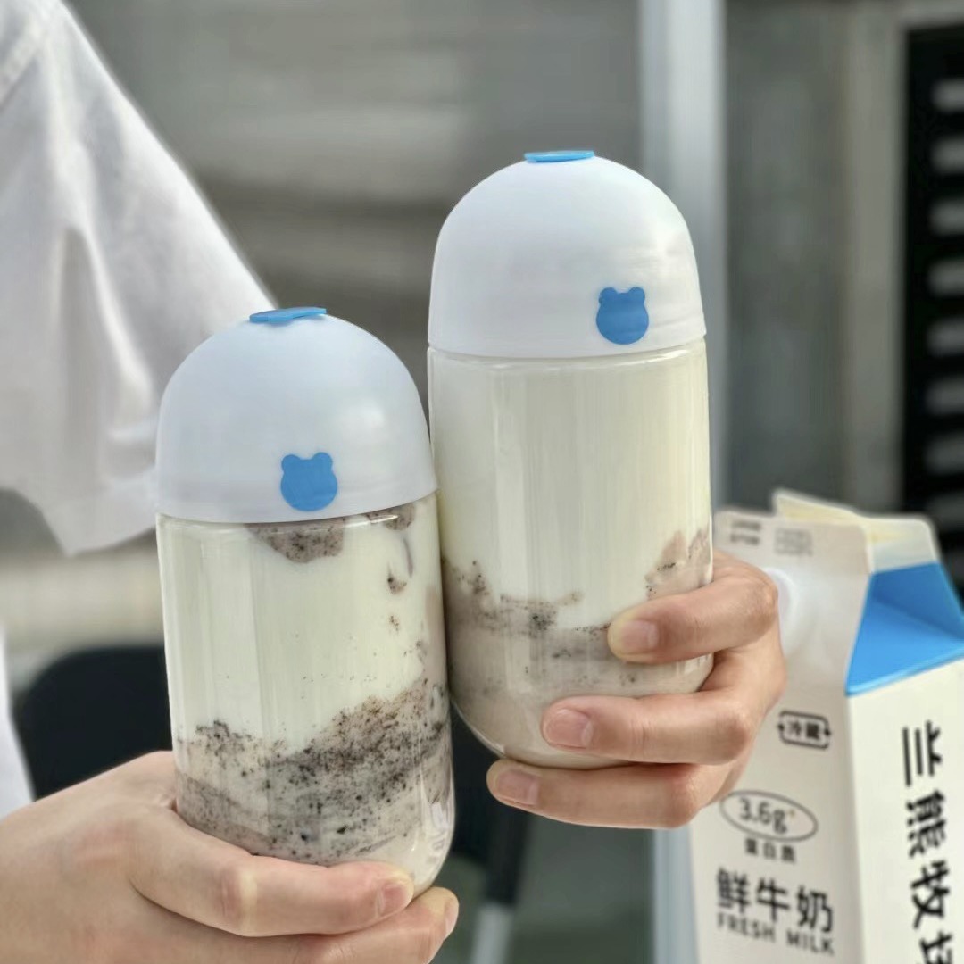 Disposable 500ml capsule bottle transparent milk tea pet take-away beverage with lid internet celebrity U-shaped plastic bottle factory