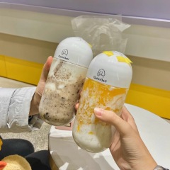 Disposable 500ml capsule bottle transparent milk tea pet take-away beverage with lid internet celebrity U-shaped plastic bottle factory