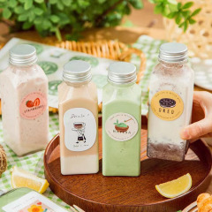 Wholesale 350ml oblique shoulder square bottle PET plastic transparent disposable juice beverage bottle net celebrity milk tea bottle packaging bottle