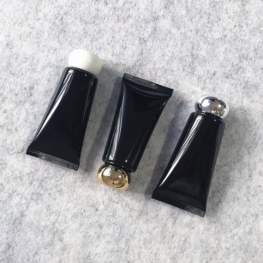 Black 40g cosmetic tube, black light-proof packaging, black bottle packaging.