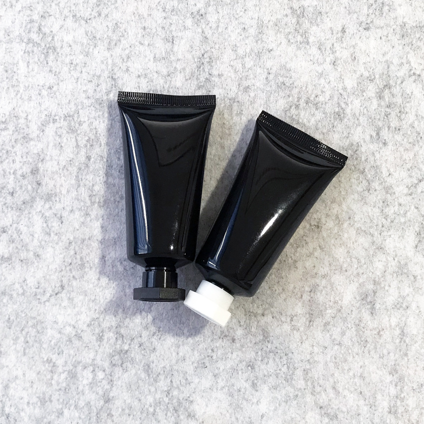 Black 40g cosmetic tube, black light-proof packaging, black bottle packaging.