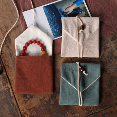 Cotton and linen jewelry bags, triangular bags, brocade pouches, small cloth bags, jewelry packaging bags, rope bags, logo-printed bags, wholesale available.
