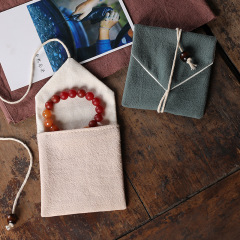 Cotton and linen jewelry bags, triangular bags, brocade pouches, small cloth bags, jewelry packaging bags, rope bags, logo-printed bags, wholesale available.