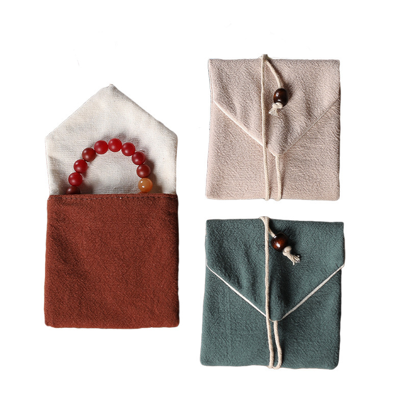 Cotton and linen jewelry bags, triangular bags, brocade pouches, small cloth bags, jewelry packaging bags, rope bags, logo-printed bags, wholesale available.