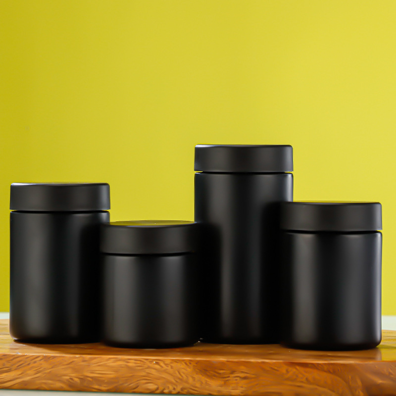 White Black Straight-Sided Round Glass Jars with Child Resistant Caps