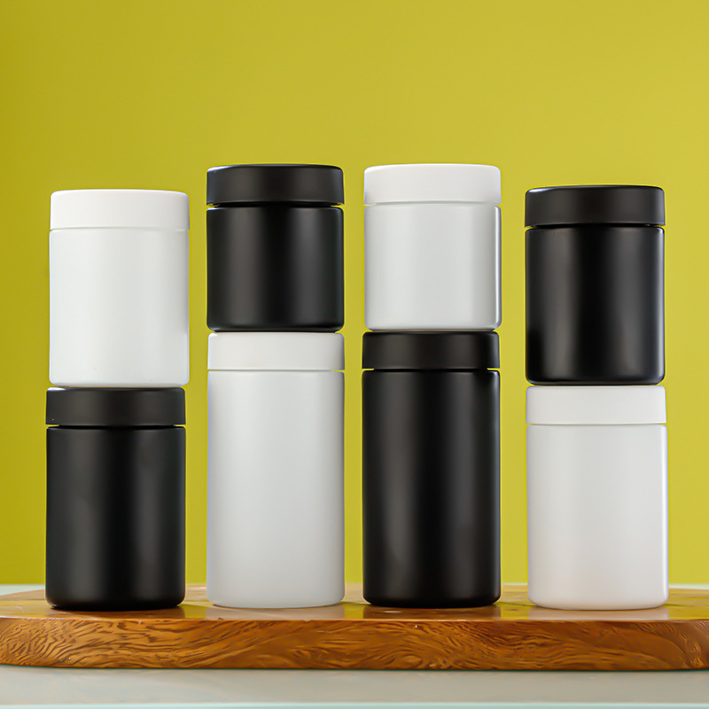 White Black Straight-Sided Round Glass Jars with Child Resistant Caps