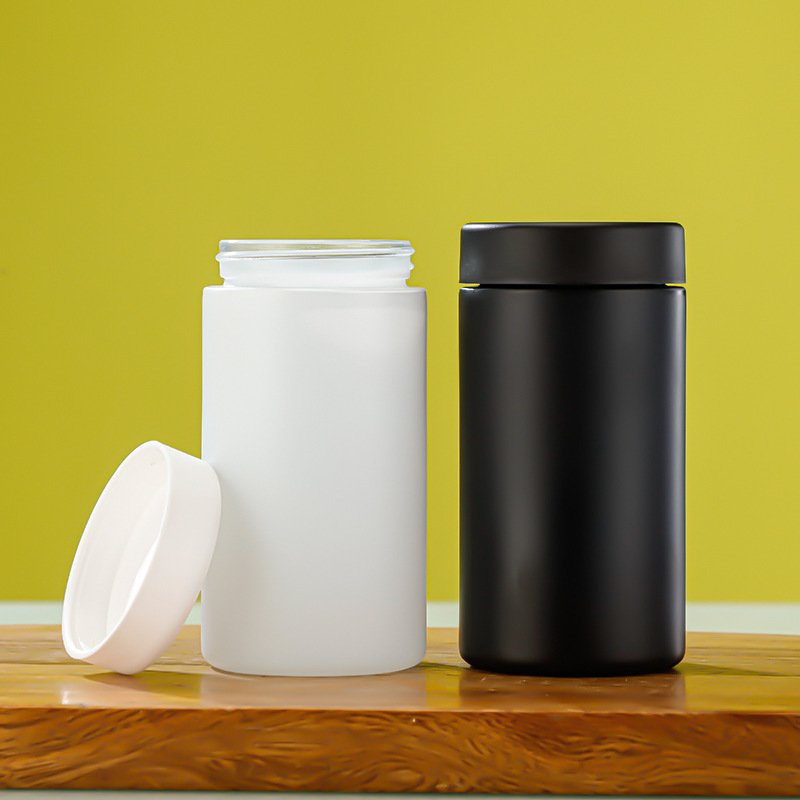 White Black Straight-Sided Round Glass Jars with Child Resistant Caps