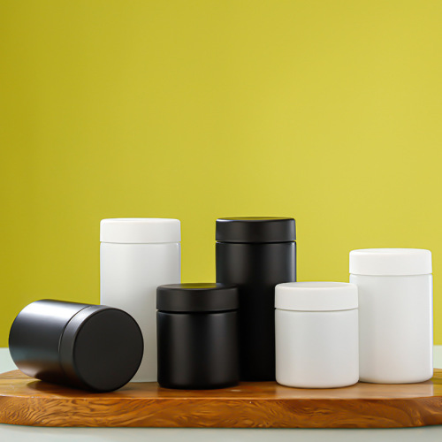 White Black Straight-Sided Round Glass Jars with Child Resistant Caps