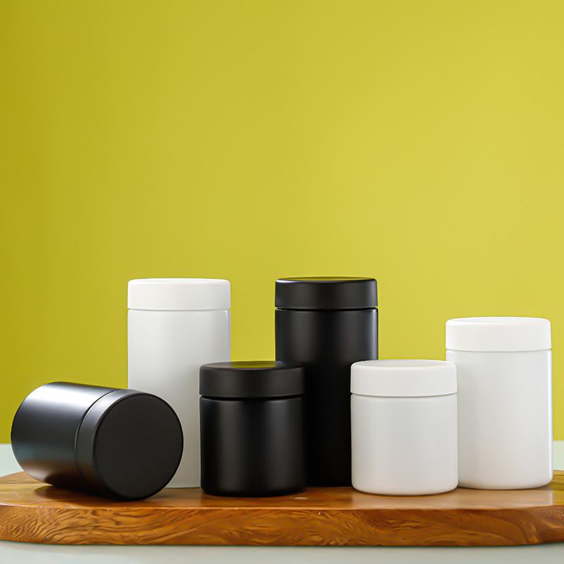 White Black Straight-Sided Round Glass Jars with Child Resistant Caps