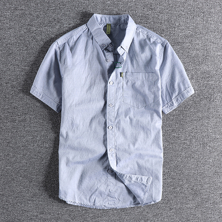 GrogeousBen  Men's Simple pocket summer solid color men's short-sleeved shirt, washed thin Oxford cloth slim lapel white shirt.