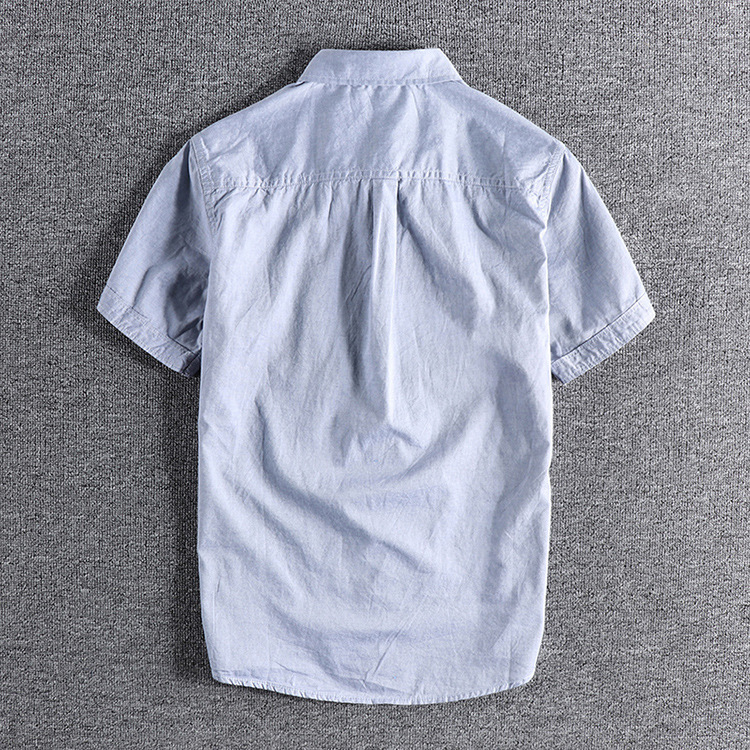 GrogeousBen  Men's Simple pocket summer solid color men's short-sleeved shirt, washed thin Oxford cloth slim lapel white shirt.