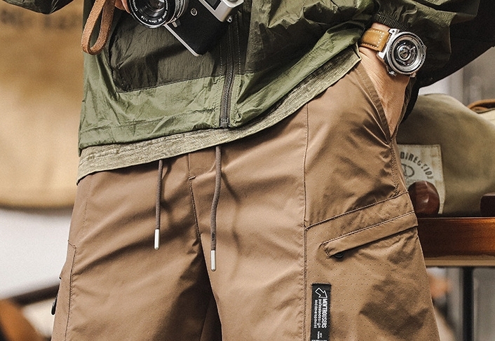 GorgeousBen American fashion retro workwear shorts for men's summer new style outdoor functional five quarter pants for men's sports and leisure mid length pants.