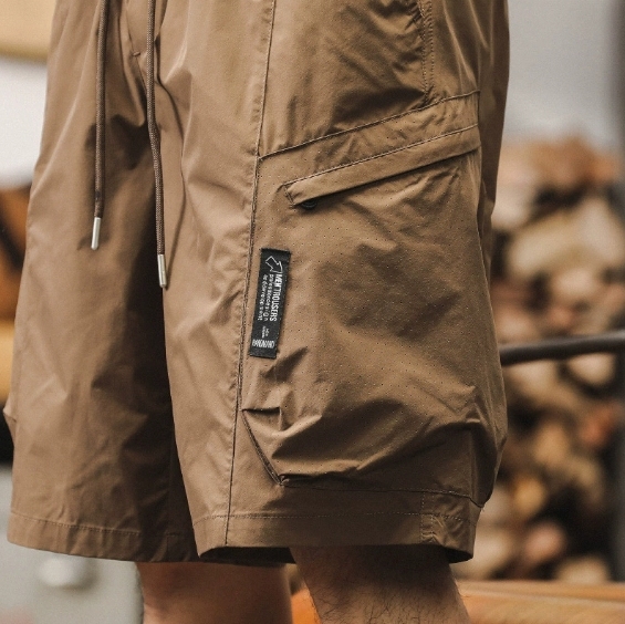 GorgeousBen American fashion retro workwear shorts for men's summer new style outdoor functional five quarter pants for men's sports and leisure mid length pants.
