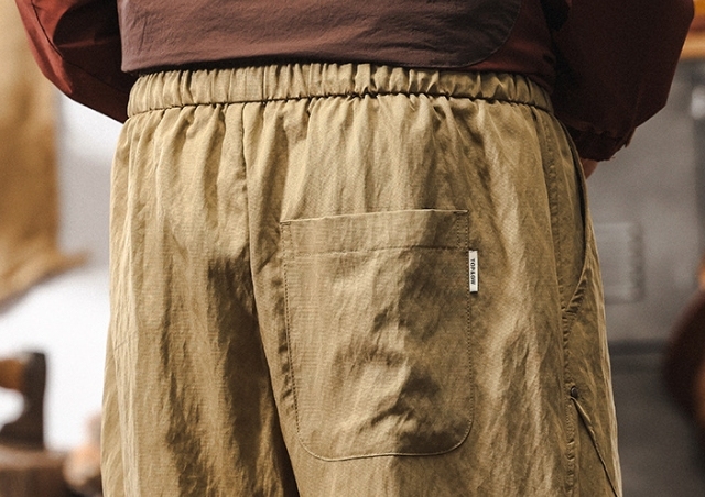 GorgeousBen Skin friendly and smooth Lyocell Tencel wrinkle resistant linen sports shorts men's summer loose thin cropped pants.