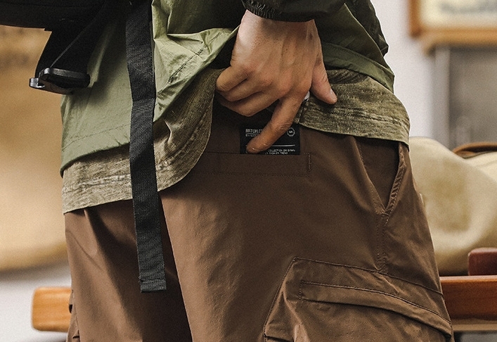 GorgeousBen American fashion retro workwear shorts for men's summer new style outdoor functional five quarter pants for men's sports and leisure mid length pants.